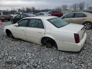 2000 Cadillac DeVille DTS z VIN 1G6KF5797YU263599, wystawiony jako Copart lot #81576484 z przebiegiem 118 414 mil mil oraz Szkoda całkowita • Salvage title. Historia ofert i sprzedaży dostępna na DreamBid. Obrazek 2.