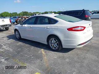 2014 Ford Fusion SE with VIN 3FA6P0HD5ER273039, listed as a IAAI auction lot 42221553 with 82,755 mi miles and . Bid and sale history available at DreamBid. Image 3.