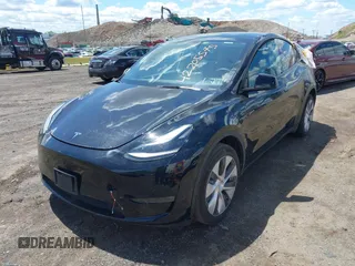 2023 Tesla Model Y Long Range with VIN 7SAYGDEE0PA183891, listed as a IAAI auction lot 42205573 with 41,273 mi miles and . Bid and sale history available at DreamBid. Image 2.