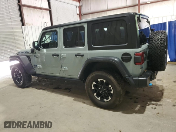 2024 Jeep Wrangler Rubicon with VIN 1C4RJXR67RW293197, listed as a Copart auction lot 59886995 with Not provided miles and Salvage title. Bid and sale history available at DreamBid. Image 2.