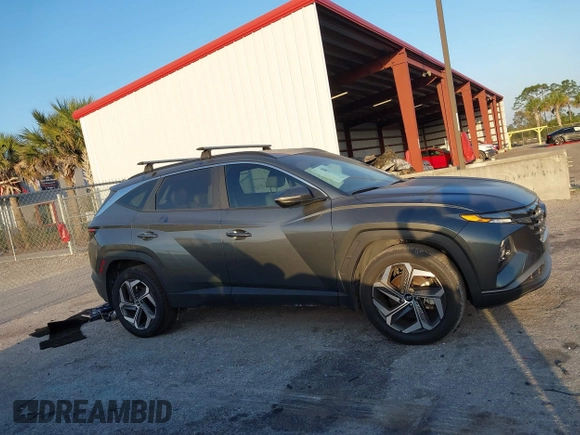 2022 Hyundai Tucson SEL z VIN 5NMJCCAE0NH149457, wystawiony jako IAAI lot #42166988 z przebiegiem 51 930 mil mil oraz . Historia ofert i sprzedaży dostępna na DreamBid. Obrazek 13.
