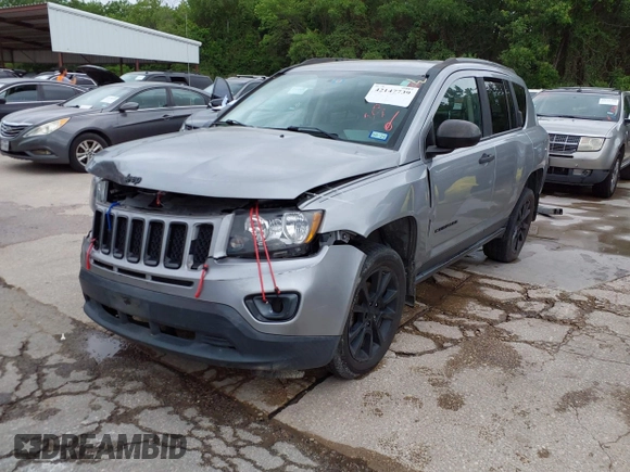 2014 Jeep Compass Sport with VIN 1C4NJCBA3ED769764, listed as a IAAI auction lot 42147739 with 141,979 mi miles. Bid and sale history available at carsss.com. Image 2.