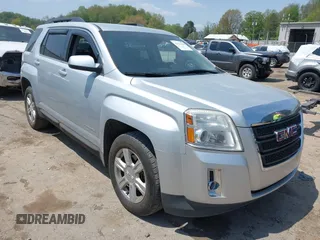 2015 GMC Terrain SLT z VIN 2GKFLXEKXF6136029, wystawiony jako IAAI lot #42133160 z przebiegiem 74 089 mil mil oraz . Historia ofert i sprzedaży dostępna na DreamBid. Obrazek 1.