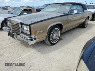 1985 Cadillac Eldorado z VIN 1G6EL578XFE614641, wystawiony jako Copart lot #75663984 z przebiegiem 54 128 mil mil oraz Szkody całkowita. Historia ofert i sprzedaży dostępna na DreamBid. Obrazek 1.