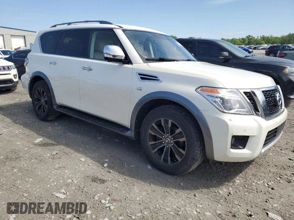 2018 Nissan Armada Platinum with VIN JN8AY2NE8J9732438, listed as a Copart auction lot 56233785 with 122,870 mi miles and Salvage title. Bid and sale history available at DreamBid. Image 4.