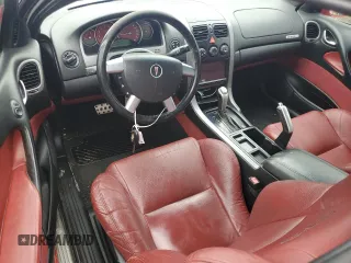 2004 Pontiac GTO z VIN 6G2VX12G04L206500, wystawiony jako Copart lot #55048785 z przebiegiem 102 254 mil mil oraz Szkody całkowita. Historia ofert i sprzedaży dostępna na DreamBid. Obrazek 8.