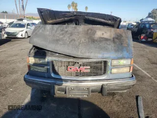1994 GMC Suburban z VIN 1GKEC16K3RJ769051, wystawiony jako Copart lot #74576864 z przebiegiem Nie podano mil oraz Nie do naprawy • Non repairable. Historia ofert i sprzedaży dostępna na DreamBid. Obrazek 5.