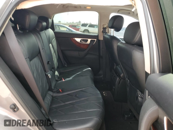 2009 Infiniti FX z VIN JNRAS18U49M101348, wystawiony jako Copart lot #48362425 z przebiegiem 183 928 mil mil oraz Szkoda całkowita • Salvage title. Historia ofert i sprzedaży dostępna na DreamBid. Obrazek 11.