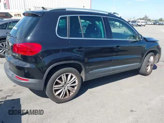 2015 Volkswagen Tiguan SE with VIN WVGAV7AX5FW509612, listed as a IAAI auction lot 42020599 with 64,201 mi miles and . Bid and sale history available at DreamBid. Image 4.