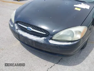 2003 Ford Taurus SE Standard with VIN 1FAFP53U13A102879, listed as a IAAI auction lot 42335795 with 193,023 mi miles and . Bid and sale history available at DreamBid. Image 6.
