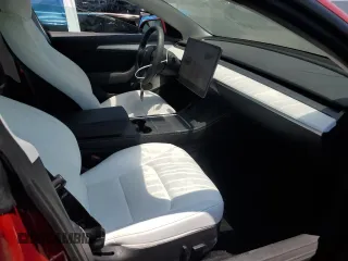 2023 Tesla Model 3 z VIN 5YJ3E1EA3PF645825, wystawiony jako Copart lot #57907795 z przebiegiem 18 810 mil mil oraz Szkoda całkowita • Salvage title. Historia ofert i sprzedaży dostępna na DreamBid. Obrazek 7.