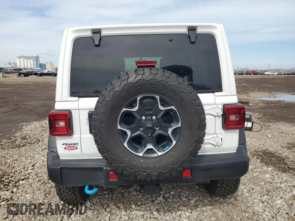 2023 Jeep Wrangler Rubicon z VIN 1C4JJXR6XPW663181, wystawiony jako Copart lot #49799125 z przebiegiem 8 085 mil mil oraz Szkoda całkowita • Salvage title. Historia ofert i sprzedaży dostępna na DreamBid. Obrazek 6.