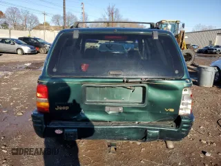 1997 Jeep Grand Cherokee Limited with VIN 1J4GZ78Y2VC728605, listed as a Copart auction lot 83342804 with 104,185 mi miles and Salvage Title. Bid and sale history available at carsss.com. Image 6.