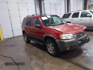 2003 Ford Escape XLT Popular 2 with VIN 1FMCU93173KA52806, listed as a IAAI auction lot 41696250 with 138,338 mi miles. Bid and sale history available at carsss.com. Image 1.