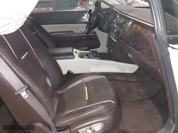 2014 Rolls-Royce Wraith with VIN SCA665C59EUX84389, listed as a IAAI auction lot 41413368 with 57,951 mi miles. Bid and sale history available at carsss.com. Image 5.