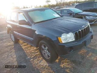 2007 Jeep Grand Cherokee Laredo with VIN 1J8GS48K17C655999, listed as a IAAI auction lot 41590500 with 290,695 mi miles. Bid and sale history available at carsss.com. Image 1.