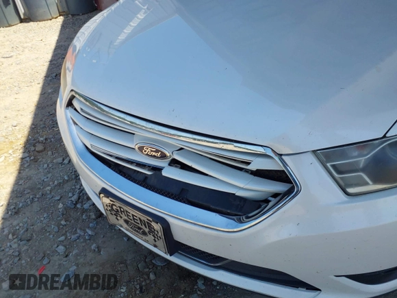 2015 Ford Taurus Limited z VIN 1FAHP2F89FG101017, wystawiony jako IAAI lot #42284459 z przebiegiem 183 167 mil mil oraz . Historia ofert i sprzedaży dostępna na DreamBid. Obrazek 6.