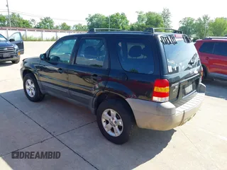 2006 Ford Escape XLT with VIN 1FMYU03176KA55498, listed as a IAAI auction lot 42499429 with 156,298 mi miles and . Bid and sale history available at DreamBid. Image 3.