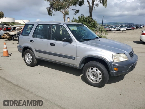 2001 Honda CR-V LX with VIN JHLRD28401S017050, listed as a Copart auction lot 51056085 with 250,336 mi miles and Salvage Title. Bid and sale history available at carsss.com. Image 4.