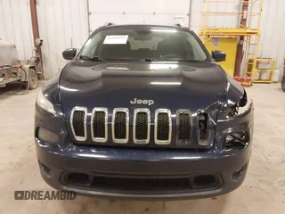 2014 Jeep Cherokee Latitude with VIN 1C4PJMCS9EW239549, listed as a IAAI auction lot 41156954 with 167,331 mi miles and . Bid and sale history available at DreamBid. Image 12.