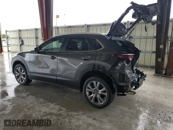 2023 Mazda CX-30 S Carbon Edition with VIN 3MVDMBCM9PM506691, listed as a Copart auction lot 55864895 with 21,441 mi miles and Salvage title. Bid and sale history available at DreamBid. Image 2.