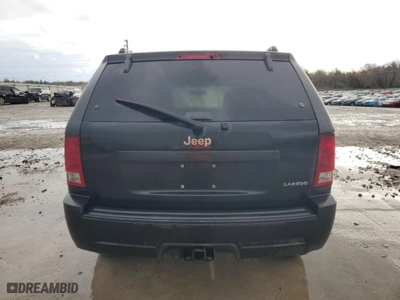 2005 Jeep Grand Cherokee Laredo with VIN 1J4HS48N05C505136, listed as a Copart auction lot 80583084 with 326,881 mi miles and Salvage Title. Bid and sale history available at carsss.com. Image 6.