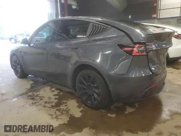 2021 Tesla Model Y Long Range with VIN 5YJYGDEE0MF076660, listed as a Copart auction lot 55957365 with 80,432 mi miles and Salvage Title. Bid and sale history available at DreamBid. Image 2.