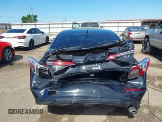 2023 Honda Civic Sport with VIN 2HGFE2F58PH557787, listed as a IAAI auction lot 42207827 with 51,885 mi miles and . Bid and sale history available at DreamBid. Image 16.