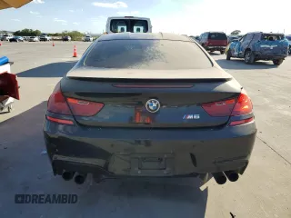 2013 BMW M6 z VIN WBSLX9C54DD159891, wystawiony jako Copart lot #77140334 z przebiegiem Nie podano mil oraz Czysty tytuł • Clean title. Historia ofert i sprzedaży dostępna na DreamBid. Obrazek 6.