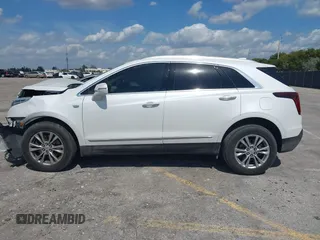 2020 Cadillac XT5 Premium Luxury FWD with VIN 1GYKNCRS7LZ129119, listed as a IAAI auction lot 41710878 with 52,575 mi miles and . Bid and sale history available at carsss.com. Image 14.