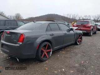 2016 Chrysler 300 S with VIN 2C3CCABG9GH230229, listed as a IAAI auction lot 40937329 with 147,808 mi miles and . Bid and sale history available at DreamBid. Image 4.