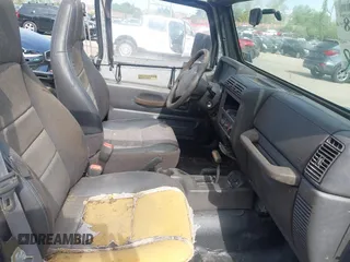 1999 Jeep Wrangler SE z VIN 1J4FY29P3XP469786, wystawiony jako IAAI lot #42131018 z przebiegiem 130 918 mil mil oraz . Historia ofert i sprzedaży dostępna na DreamBid. Obrazek 5.