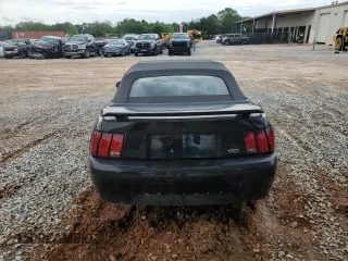 2003 Ford Mustang Deluxe z VIN 1FAFP44433F364091, wystawiony jako Copart lot #54061935 z przebiegiem 201 406 mil mil oraz Szkoda całkowita • Salvage title. Historia ofert i sprzedaży dostępna na DreamBid. Obrazek 6.
