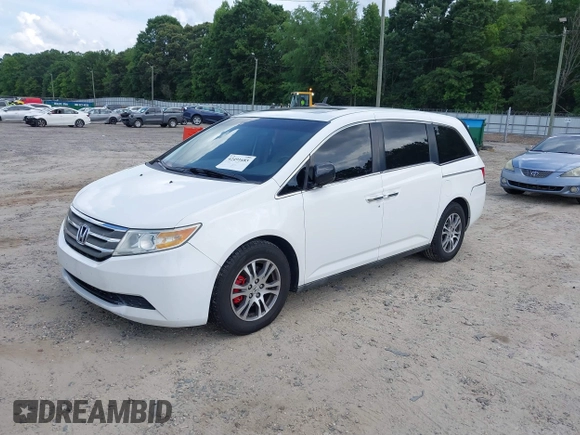 2011 Honda Odyssey EX-L with VIN 5FNRL5H67BB011070, listed as a IAAI auction lot 42491685 with 200,671 mi miles and . Bid and sale history available at DreamBid. Image 17.