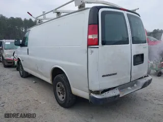 2005 Chevrolet Express Cargo Van with VIN 1GCGG25V351163463, listed as a IAAI auction lot 41407058 with 236,277 mi miles. Bid and sale history available at carsss.com. Image 3.
