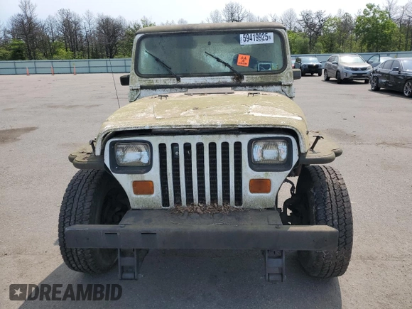 1993 Jeep Wrangler z VIN 1J4FY29SXPP206084, wystawiony jako Copart lot #59419925 z przebiegiem 154 021 mil mil oraz Czysty tytuł • Clean title. Historia ofert i sprzedaży dostępna na DreamBid. Obrazek 5.