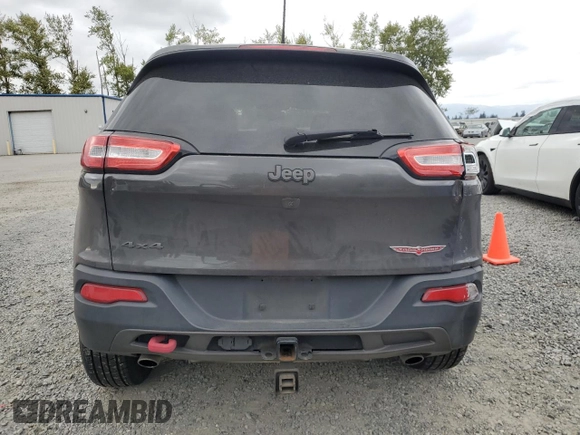 2017 Jeep Cherokee Trailhawk z VIN 1C4PJMBS0HW577055, wystawiony jako Copart lot #56428235 z przebiegiem 137 296 mil mil oraz Szkoda całkowita • Salvage title. Historia ofert i sprzedaży dostępna na DreamBid. Obrazek 6.