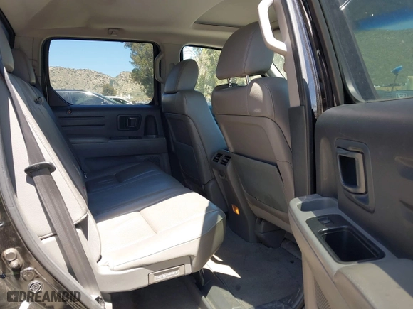 2011 Honda Ridgeline RTL with VIN 5FPYK1F50BB001442, listed as a IAAI auction lot 42023615 with 189,170 mi miles. Bid and sale history available at carsss.com. Image 8.
