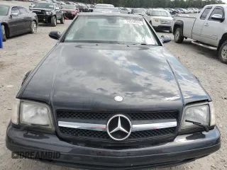 1999 Mercedes-Benz SL-Class with VIN WDBFA68F3XF187095, listed as a Copart auction lot 74514554 with 131,352 mi miles and Salvage Title. Bid and sale history available at carsss.com. Image 5.