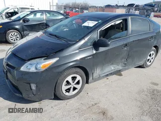 2015 Toyota Prius Four with VIN JTDKN3DU9F0403735, listed as a IAAI auction lot 41477562 with 113,934 mi miles. Bid and sale history available at carsss.com. Image 2.