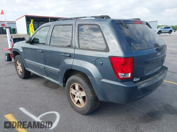 2007 Jeep Grand Cherokee Laredo with VIN 1J8GS48K17C684497, listed as a IAAI auction lot 42136314 with 155,024 mi miles. Bid and sale history available at carsss.com. Image 3.