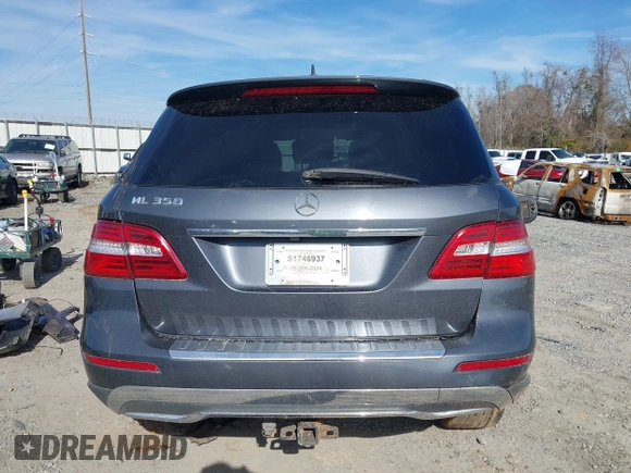 2014 Mercedes-Benz M 350 with VIN 4JGDA5JB2EA319263, listed as a IAAI auction lot 41464225 with 169,292 mi miles and . Bid and sale history available at DreamBid. Image 17.