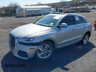 2016 Audi Q3 Premium Plus with VIN WA1EFCFS1GR016996, listed as a IAAI auction lot 41942380 with 90,852 mi miles and . Bid and sale history available at DreamBid. Image 17.