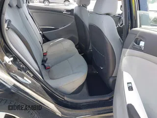 2014 Hyundai Accent SE z VIN KMHCU5AE6EU165345, wystawiony jako IAAI lot #42308781 z przebiegiem 98 216 mil mil oraz . Historia ofert i sprzedaży dostępna na DreamBid. Obrazek 8.