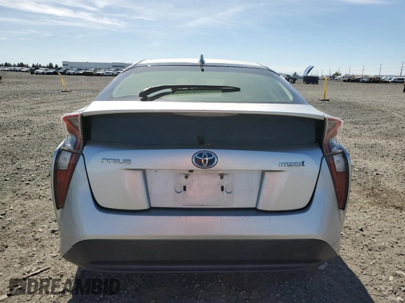 2016 Toyota Prius Two z VIN JTDKBRFU2G3020745, wystawiony jako Copart lot #58705525 z przebiegiem 134 564 mil mil oraz Czysty tytuł • Clean title. Historia ofert i sprzedaży dostępna na DreamBid. Obrazek 6.
