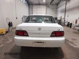 1995 Toyota Camry LE z VIN JT2SK12E8S0299203, wystawiony jako IAAI lot #39607993 z przebiegiem 193 374 mil mil oraz . Historia ofert i sprzedaży dostępna na DreamBid. Obrazek 16.