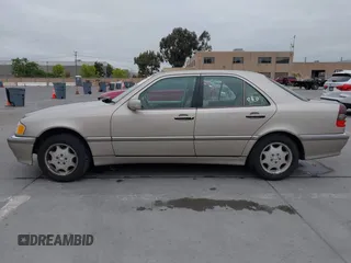 1999 Mercedes-Benz C 230/260/280/320 with VIN WDBHA29G8XA784619, listed as a IAAI auction lot 42120920 with 49,387 mi miles and . Bid and sale history available at DreamBid. Image 14.