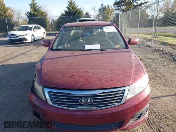 2009 Kia Optima LX z VIN KNAGE228995289603, wystawiony jako IAAI lot #40716738 z przebiegiem 209 904 mil mil oraz . Historia ofert i sprzedaży dostępna na DreamBid. Obrazek 12.