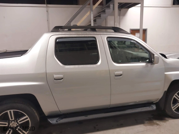 2014 Honda Ridgeline SE with VIN 5FPYK1F65EB006410, listed as a IAAI auction lot 41471886 with 92,406 mi miles. Bid and sale history available at carsss.com. Image 14.