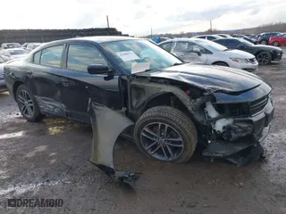 2019 Dodge Charger SXT with VIN 2C3CDXJG3KH630975, listed as a IAAI auction lot 41580174 with 74,575 mi miles. Bid and sale history available at carsss.com. Image 1.